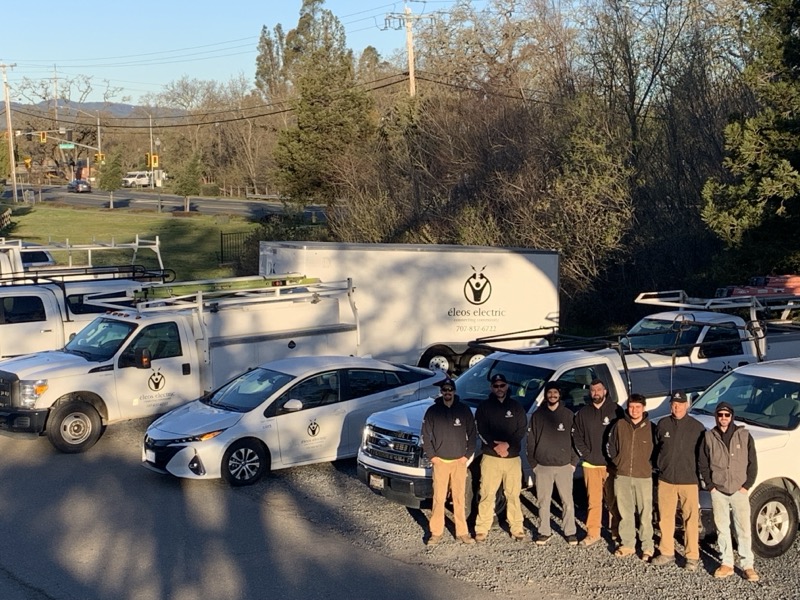 Electrician working on electrical panel