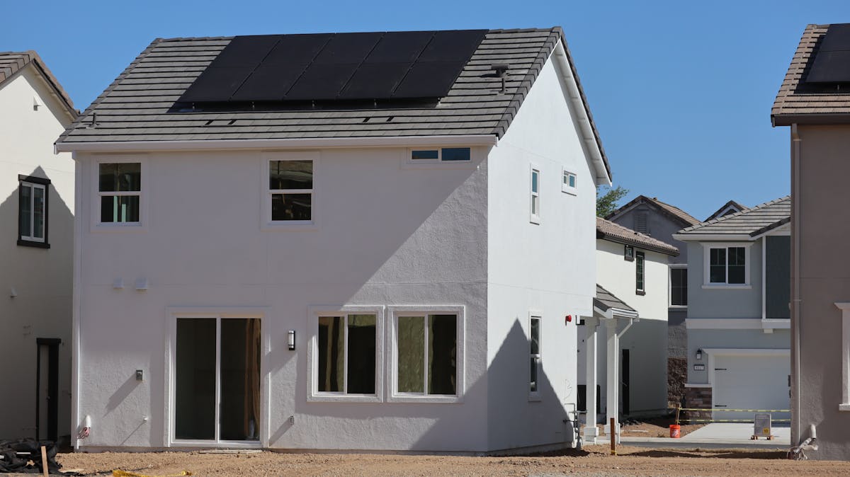 California home with rooftop solar panels paired with battery storage